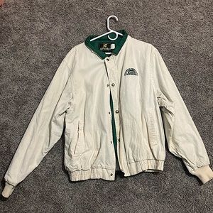 Tan and green jacket.